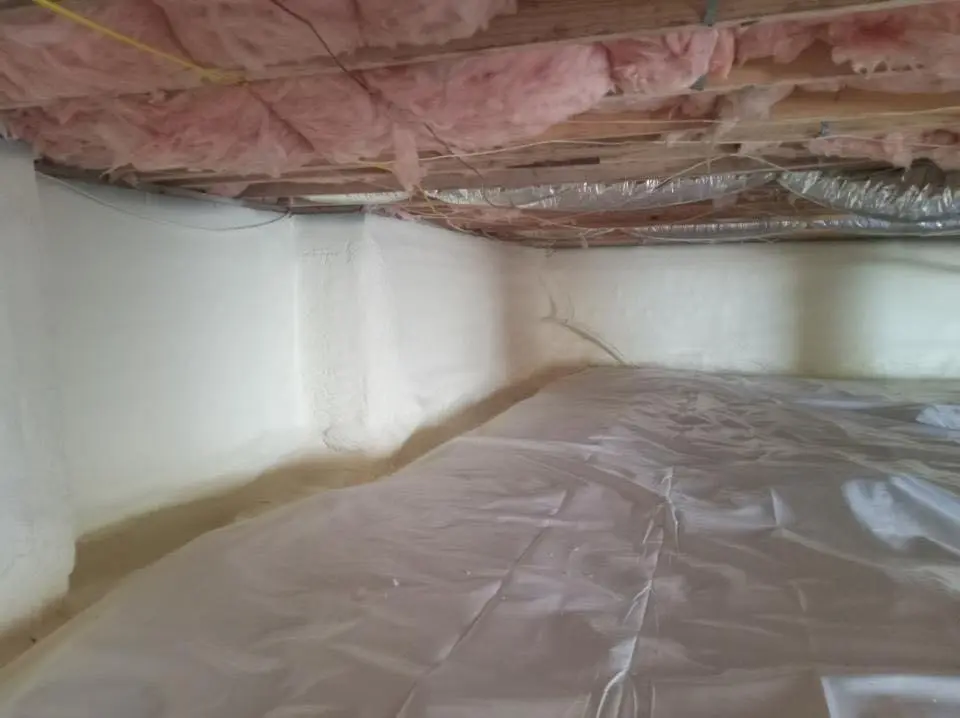 Crawl space encapsulation with closed-cell spray foam for Roof Waterproofing in Oelwein